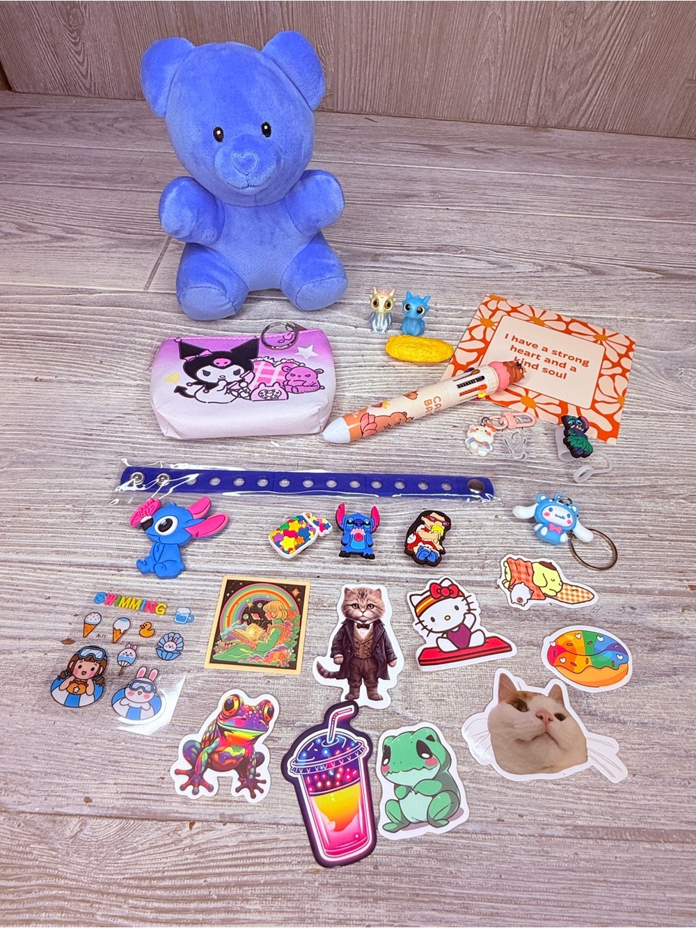 Plush bear with Sanrio coin purse stickers pens , keychain, croc charm bracelet